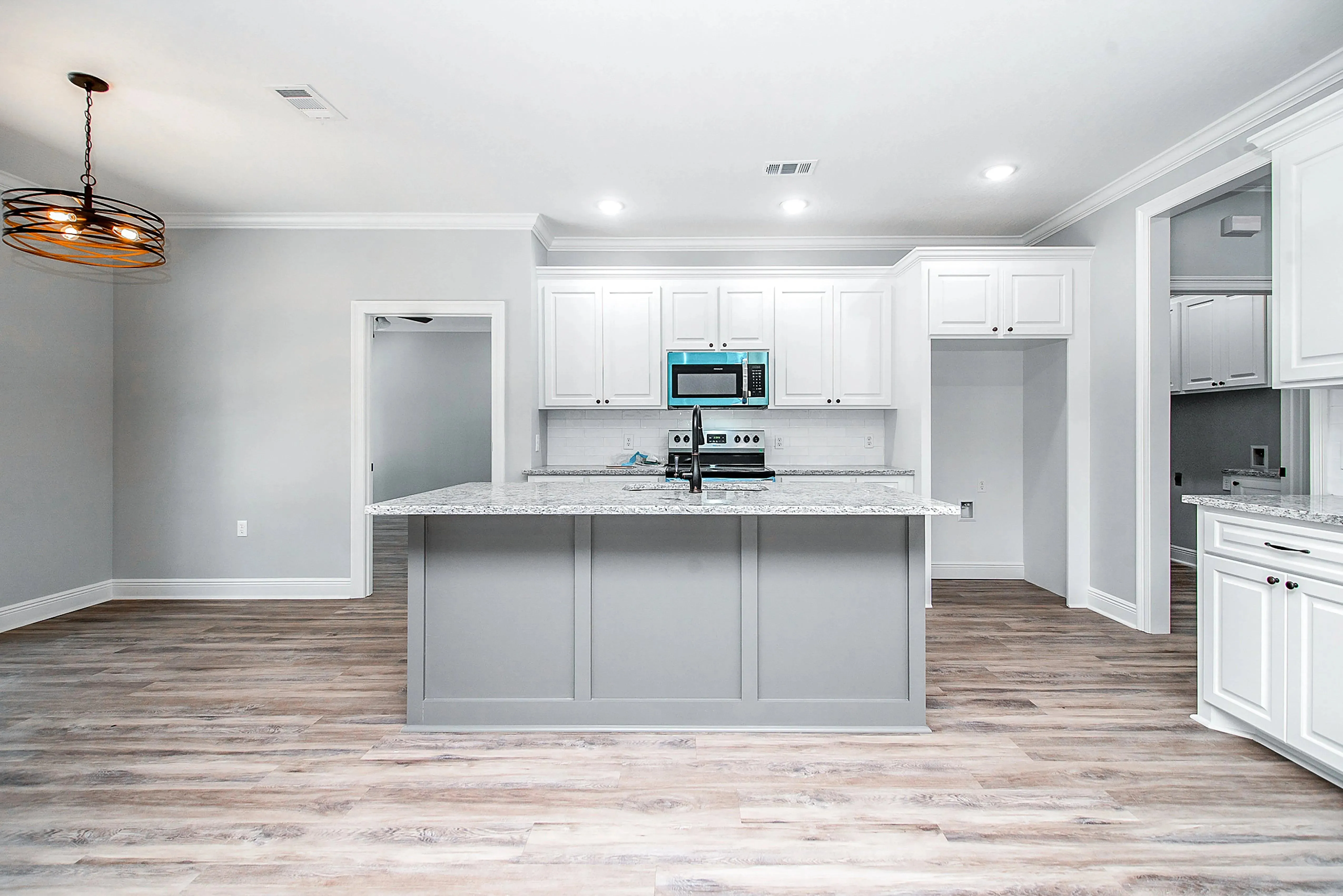 Charming 4-Bedroom Home Plan with Front Garage and Inviting Porch