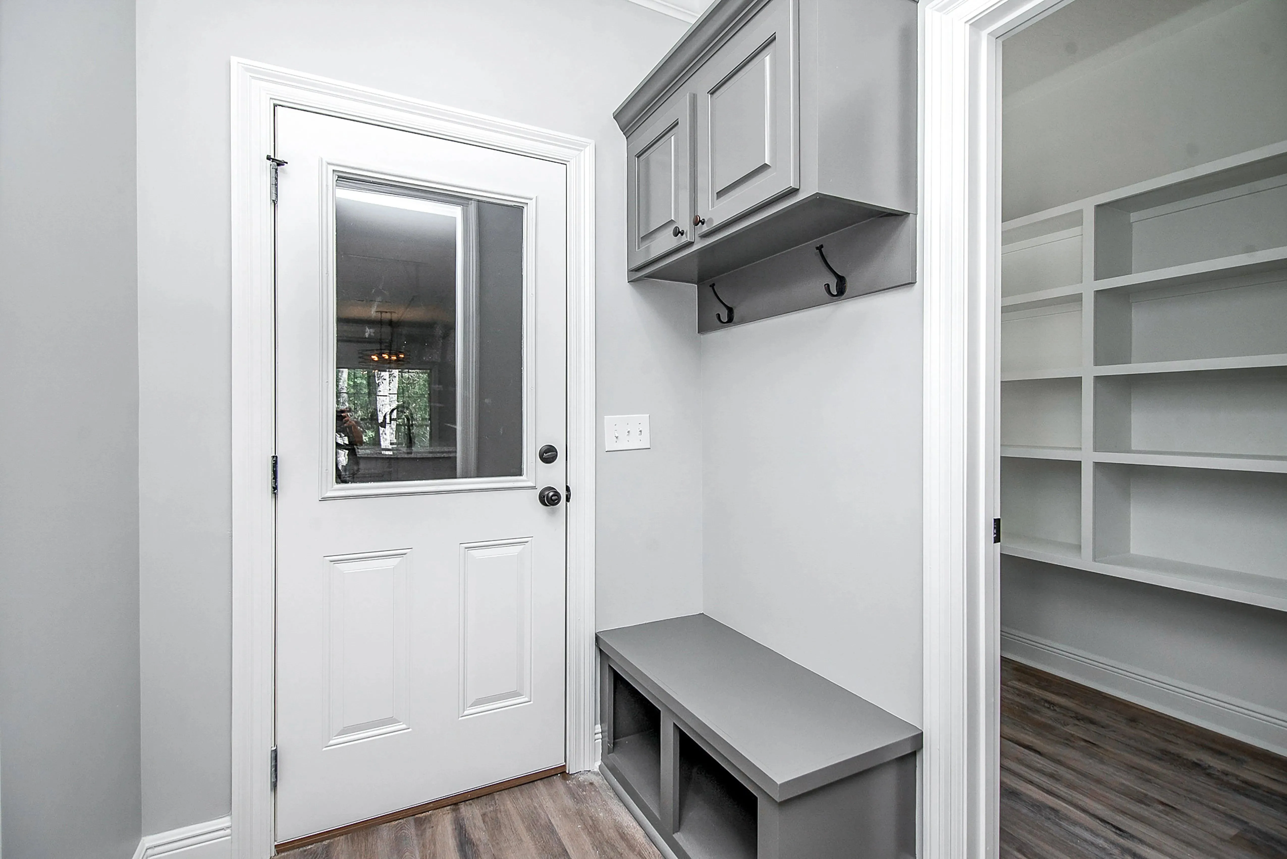 Charming 4-Bedroom Home Plan with Front Garage and Inviting Porch