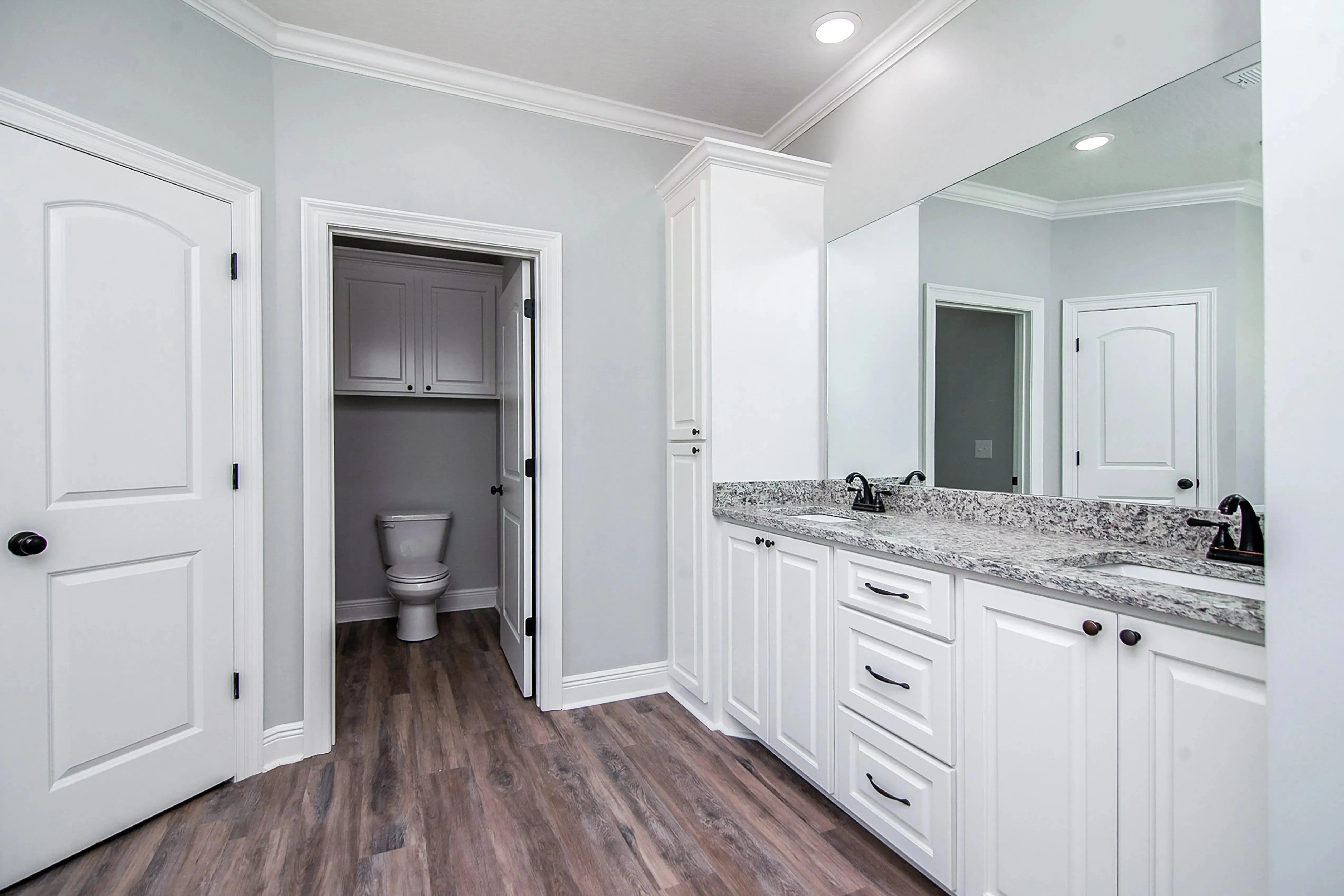Charming 4-Bedroom Home Plan with Front Garage and Inviting Porch